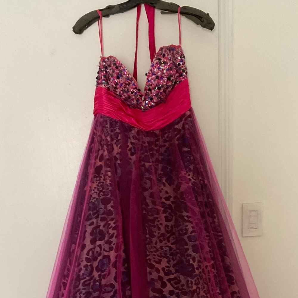Sweet sixteen, prom, quincineria, pink with white blue black leapord undertones.